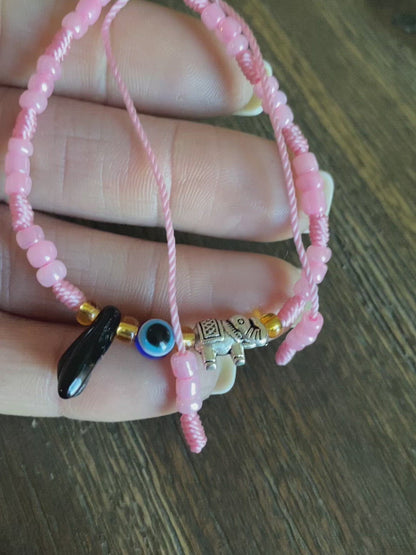 Pink Bracelet With Azabache and Charms