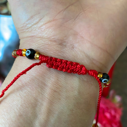 Red Bracelet with Black Evil Eye