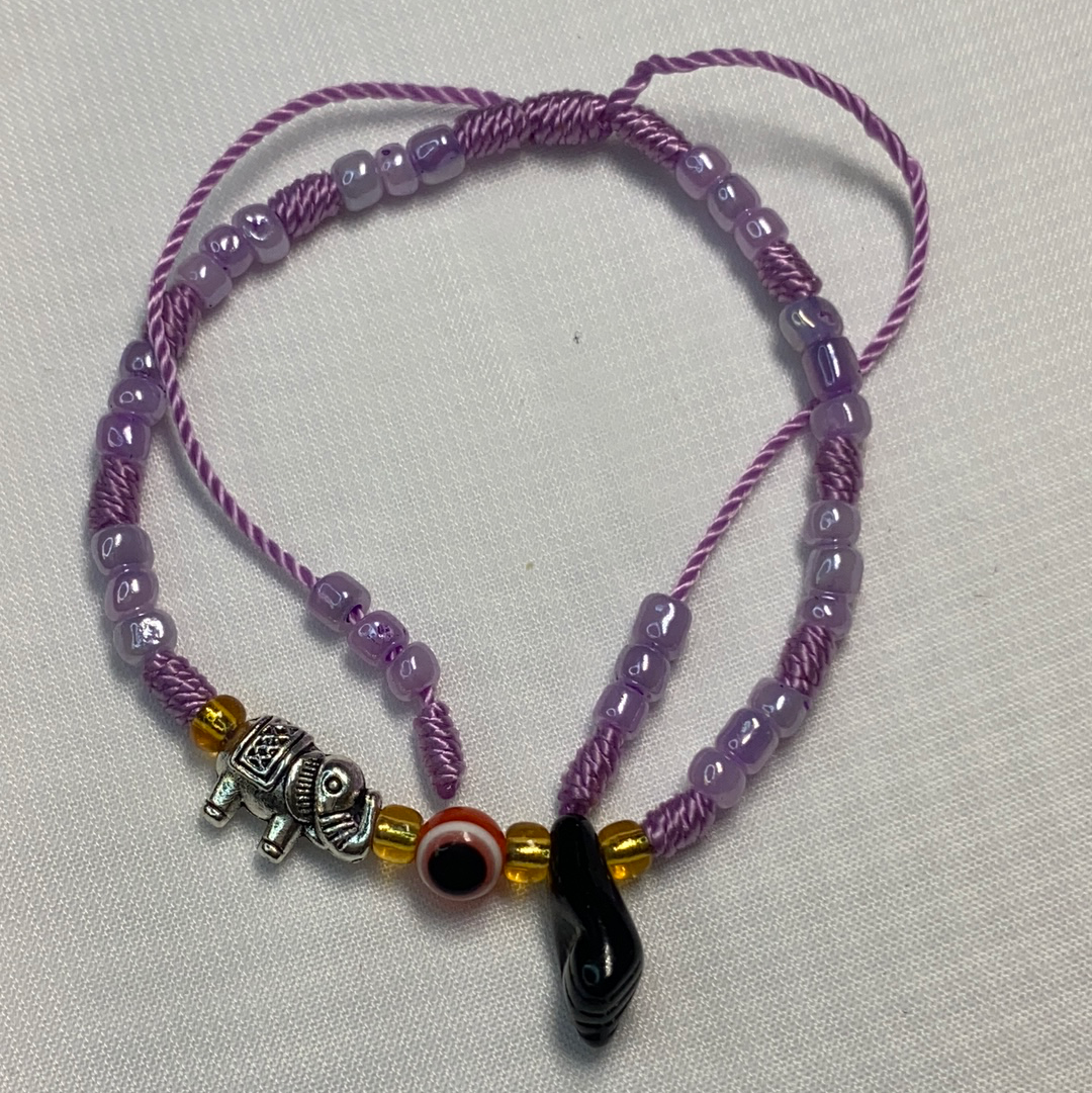 Purple Bracelet With Azabache And Charms