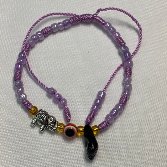 Purple Bracelet With Azabache And Charms