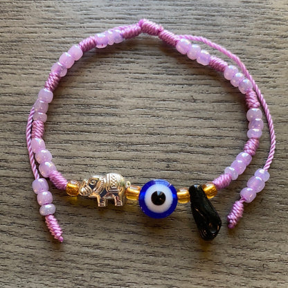Purple Bracelet With Azabache and Charms
