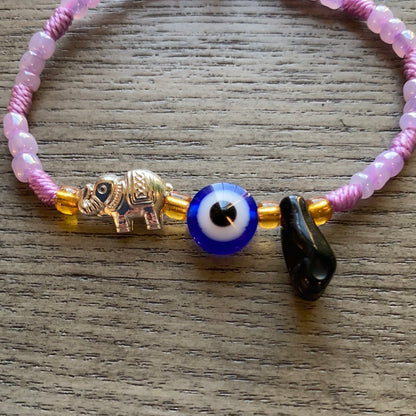Purple Bracelet With Azabache and Charms