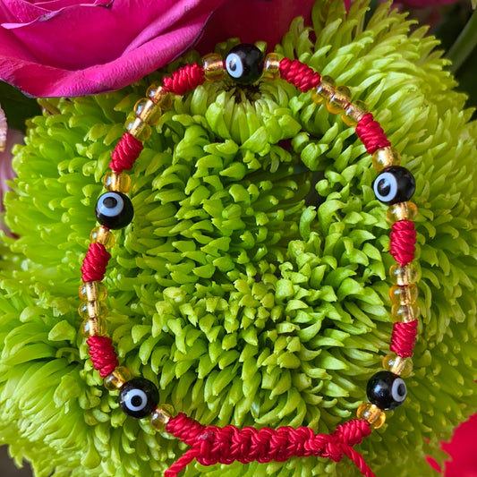 Red Bracelet with Black Evil Eye